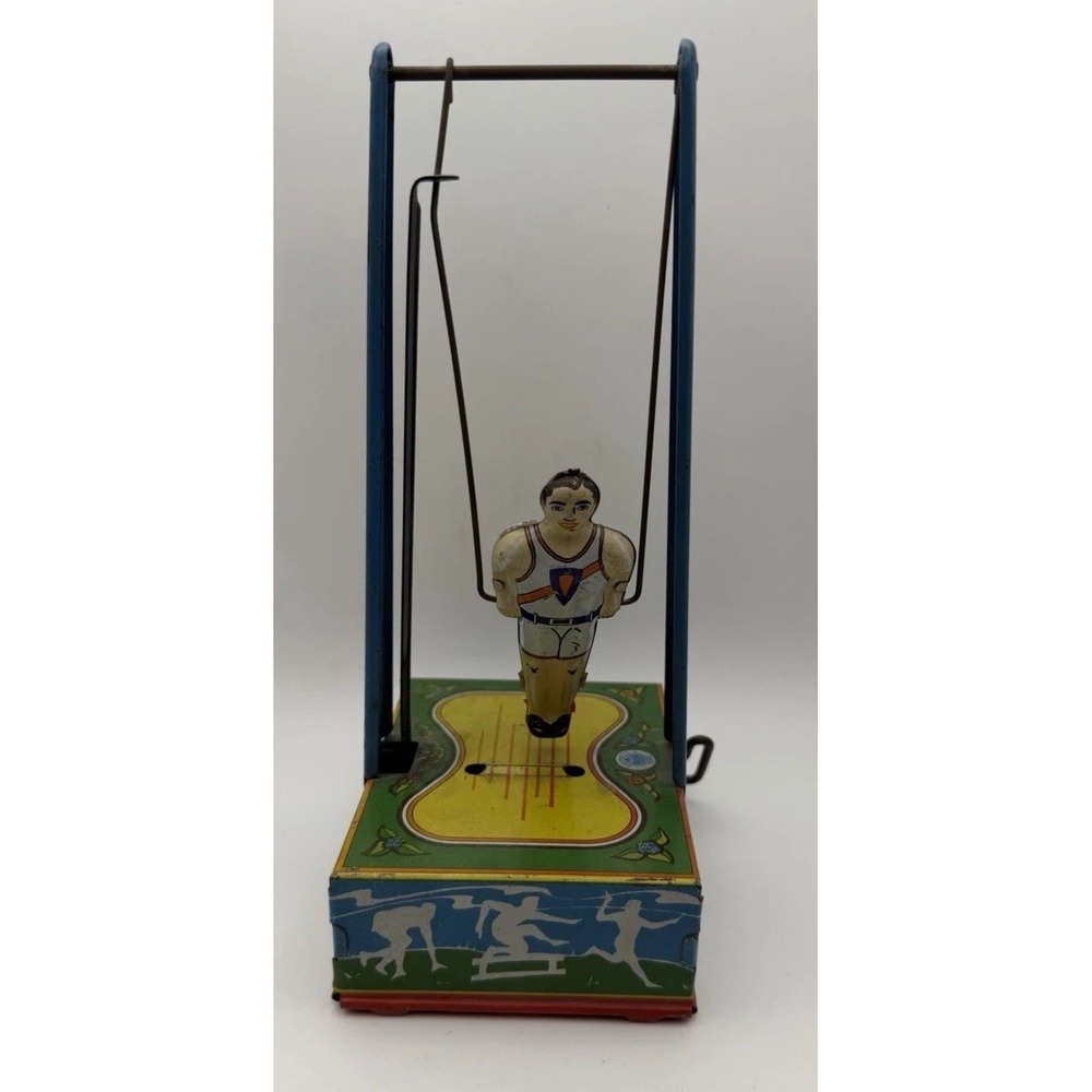 Vintage Wyandotte Wind-Up Man on Flying Trapeze Tin Litho Toy
